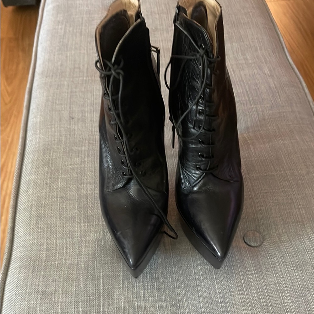 Prada Black Lace Up Boots with Sophisticated Design